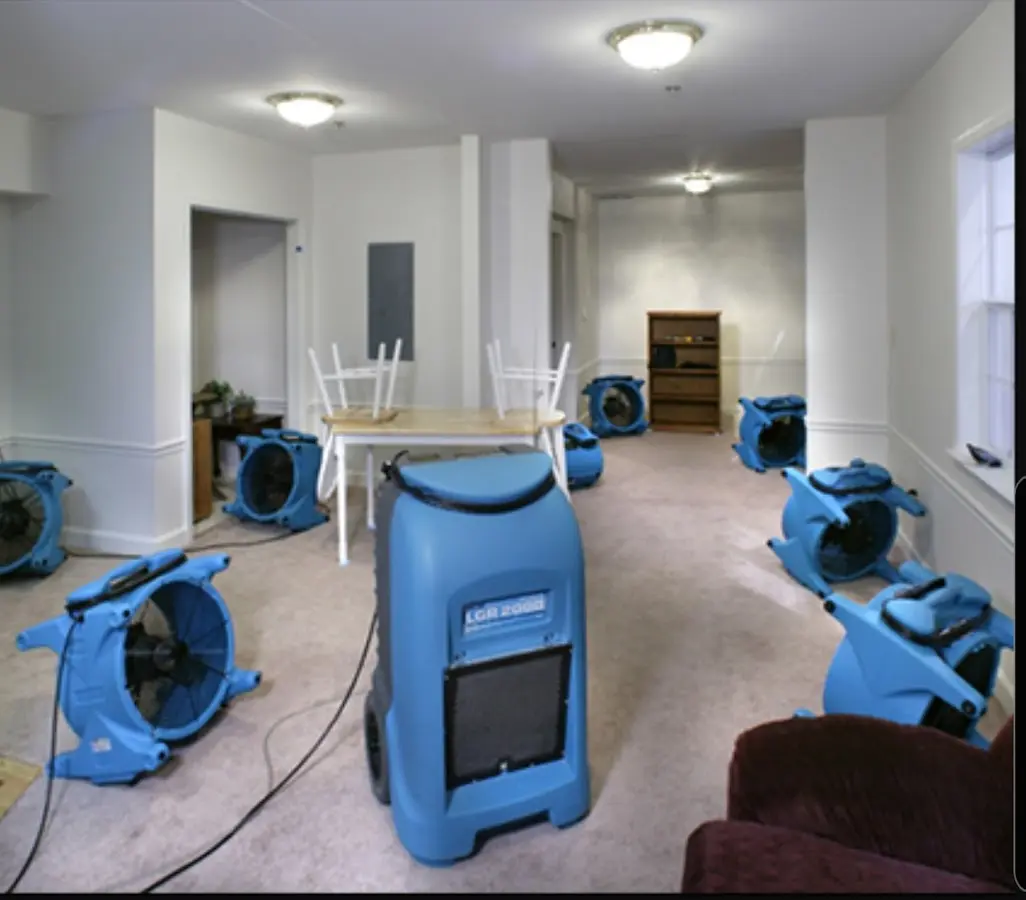 Air movers and dehumidifier setup for Water Damage Restoration in Rockwood